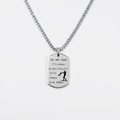 Necklace with a pendant engraved with text on a white background