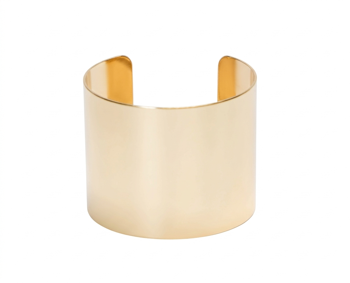 Gold cuff bracelet on a white background